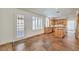 Bright kitchen with wood cabinets, tile floor, and island at 2374 Thayer Ave, Henderson, NV 89074