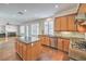 Modern kitchen with large island, stainless steel appliances, and granite countertops at 2374 Thayer Ave, Henderson, NV 89074