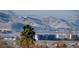 Aerial view showing surrounding neighborhood and mountain backdrop at 2575 Red Planet St, Henderson, NV 89044