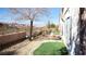 Landscaped backyard with artificial turf and mountain views at 2575 Red Planet St, Henderson, NV 89044