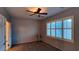 Bedroom with ceiling fan and window shutters at 2575 Red Planet St, Henderson, NV 89044