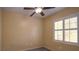 Bright bedroom with window and ceiling fan at 2575 Red Planet St, Henderson, NV 89044