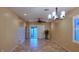 Bright dining room featuring tile floors and a sliding glass door to patio at 2575 Red Planet St, Henderson, NV 89044