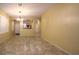 Dining room with tile floors, neutral walls and kitchen access at 2575 Red Planet St, Henderson, NV 89044