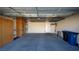 Attached garage with built-in storage and overhead shelving at 2575 Red Planet St, Henderson, NV 89044