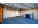 Attached garage with built-in storage and overhead shelving at 2575 Red Planet St, Henderson, NV 89044