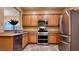 Modern kitchen with stainless steel appliances and ample counter space at 2575 Red Planet St, Henderson, NV 89044