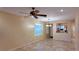 Open living room with tile floors and a view of the kitchen at 2575 Red Planet St, Henderson, NV 89044