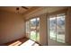 Bright sunroom with sliding glass doors leading to the backyard at 2575 Red Planet St, Henderson, NV 89044