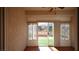 Bright sunroom with sliding glass doors leading to the backyard at 2575 Red Planet St, Henderson, NV 89044