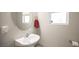 Clean and simple powder room with a pedestal sink at 264 Bella Matese Ave, Las Vegas, NV 89183