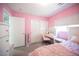 Serene pink bedroom with a cozy bed and vanity at 264 Bella Matese Ave, Las Vegas, NV 89183