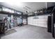 Garage with overhead storage and epoxy floor at 264 Bella Matese Ave, Las Vegas, NV 89183