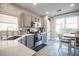 Modern kitchen with stainless steel appliances and white quartz countertops at 264 Bella Matese Ave, Las Vegas, NV 89183