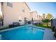 Sparkling blue pool with a spacious patio for sunbathing and relaxation at 264 Bella Matese Ave, Las Vegas, NV 89183