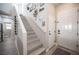 Modern staircase with light-colored wood-look flooring at 264 Bella Matese Ave, Las Vegas, NV 89183