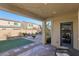 Covered patio with artificial turf and string lights at 266 Cullerton St, Las Vegas, NV 89148