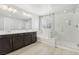 Bathroom with double vanity, shower, and soaking tub at 266 Cullerton St, Las Vegas, NV 89148