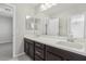 Double sink bathroom vanity with dark brown cabinets at 266 Cullerton St, Las Vegas, NV 89148