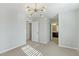 Well-lit bedroom with carpet and an ensuite bathroom at 266 Cullerton St, Las Vegas, NV 89148