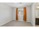 Charming bedroom with window and burnt orange curtains at 266 Cullerton St, Las Vegas, NV 89148