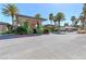 Community entrance with palm trees and landscaped grounds at 266 Cullerton St, Las Vegas, NV 89148