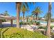 Resort-style pool with palm trees and a shaded area at 266 Cullerton St, Las Vegas, NV 89148