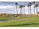 Landscaped golf course with a pond and walkway at 266 Cullerton St, Las Vegas, NV 89148