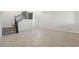 Spacious living room with tile floors and neutral walls at 266 Cullerton St, Las Vegas, NV 89148