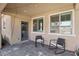 Relaxing patio area with rocking chairs and string lights at 266 Cullerton St, Las Vegas, NV 89148