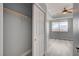 Bedroom with wood-look floors, large window and closet at 27 E Agate Ave # 505, Las Vegas, NV 89123