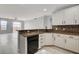 Modern kitchen with granite countertops and breakfast bar at 27 E Agate Ave # 505, Las Vegas, NV 89123