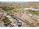 Aerial view of a house next to a school in a residential neighborhood at 308 Belfast St, Henderson, NV 89015