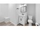 Simple bathroom with single vanity and toilet at 308 Belfast St, Henderson, NV 89015