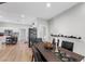 Open dining area with dark wood table and black chairs at 308 Belfast St, Henderson, NV 89015