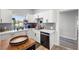 Updated kitchen, featuring white cabinets and a butcher block island at 308 Belfast St, Henderson, NV 89015