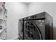 Laundry room with black LG washer and dryer set at 308 Belfast St, Henderson, NV 89015