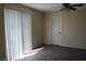 Bedroom with sliding door and ceiling fan at 3309 Conterra Park Ave, North Las Vegas, NV 89081