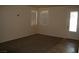 Living room with carpet, tile, and entryway at 3309 Conterra Park Ave, North Las Vegas, NV 89081