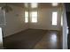 Living room with carpet, tile, and entryway at 3309 Conterra Park Ave, North Las Vegas, NV 89081