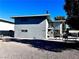 Side view of a two-story building with a patio area at 3370 Athens St, Las Vegas, NV 89169