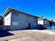 Rear view of a two-story building with parking area at 3370 Athens St, Las Vegas, NV 89169