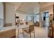 Open concept dining area with modern table and chairs, adjacent to kitchen at 353 E Bonneville Ave # 761, Las Vegas, NV 89101