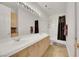 Elegant bathroom with double vanity, shower, and bathtub at 385 Apple River Ct, Las Vegas, NV 89148