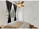 Bright bedroom with hardwood floors and ceiling fan at 385 Apple River Ct, Las Vegas, NV 89148