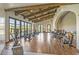 Spacious gym with high ceilings, wood floors, and a variety of modern exercise equipment, great for fitness enthusiasts at 43 Strada Loreto, Henderson, NV 89011