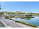 Picturesque waterfront view of Lake Las Vegas featuring boat docks, recreational boats, and lakeside buildings at 43 Strada Loreto, Henderson, NV 89011