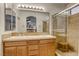 Bathroom with double vanity and large walk-in shower at 4412 Desert Park Ave, North Las Vegas, NV 89085