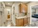 Hallway with built-in cabinets and views into other rooms at 4412 Desert Park Ave, North Las Vegas, NV 89085