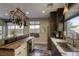 Modern kitchen with butcher block island and stainless steel sink at 4412 Desert Park Ave, North Las Vegas, NV 89085